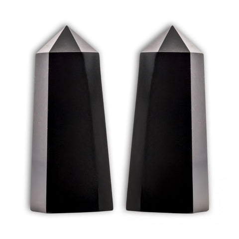 Punta de Obsidiana negra con base plana mediana